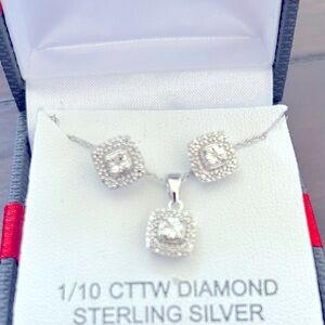 1/10 CTTW Diamond and sterling silver necklace and earrings